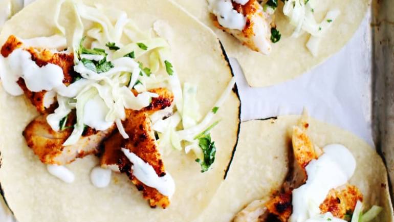 Fish Tacos with Cabbage Slaw and Lime Creme